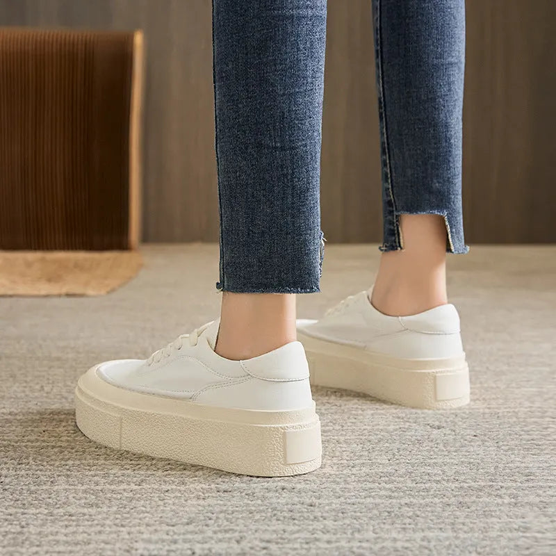 Women's black platform sports board shoes with embossed cowhide upper and lace-up closure