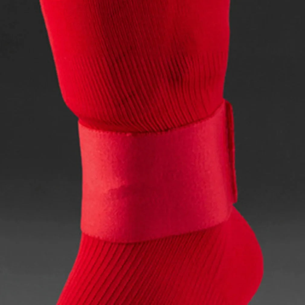 Elastic rubber shin guard tape belt in red, blue, black, and white colours for football and cycling