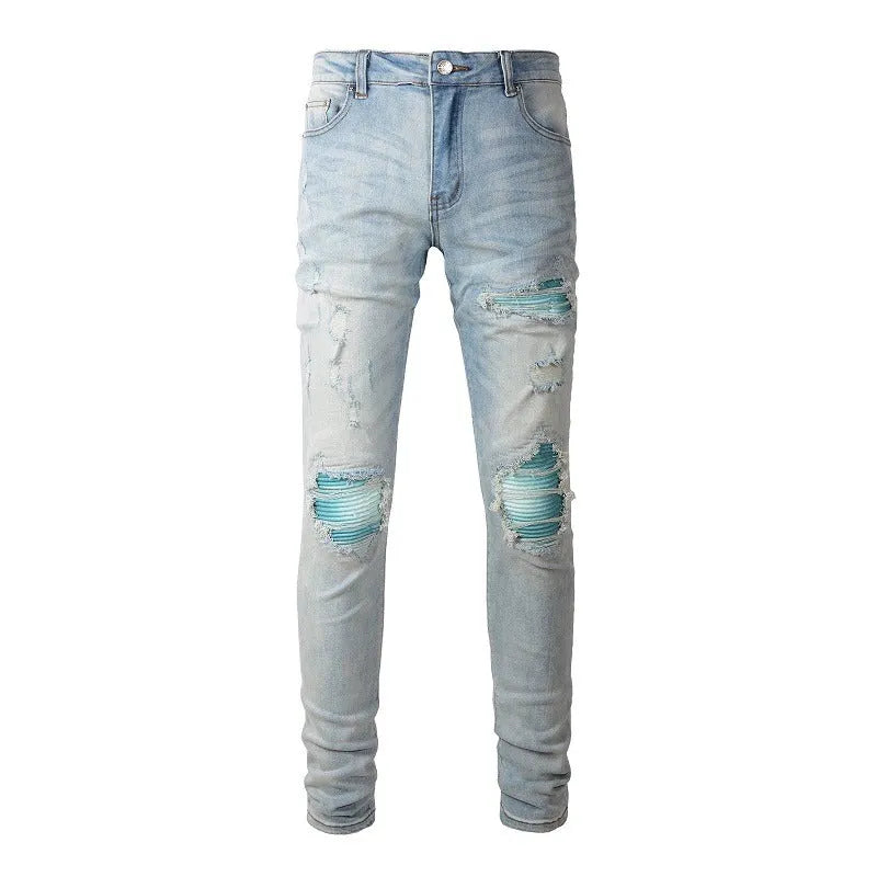 Men's light blue distressed slim fit jeans with five pocket patchwork, enzyme washed, side view