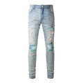 Men's light blue distressed slim fit jeans with five pocket patchwork, enzyme washed, side view