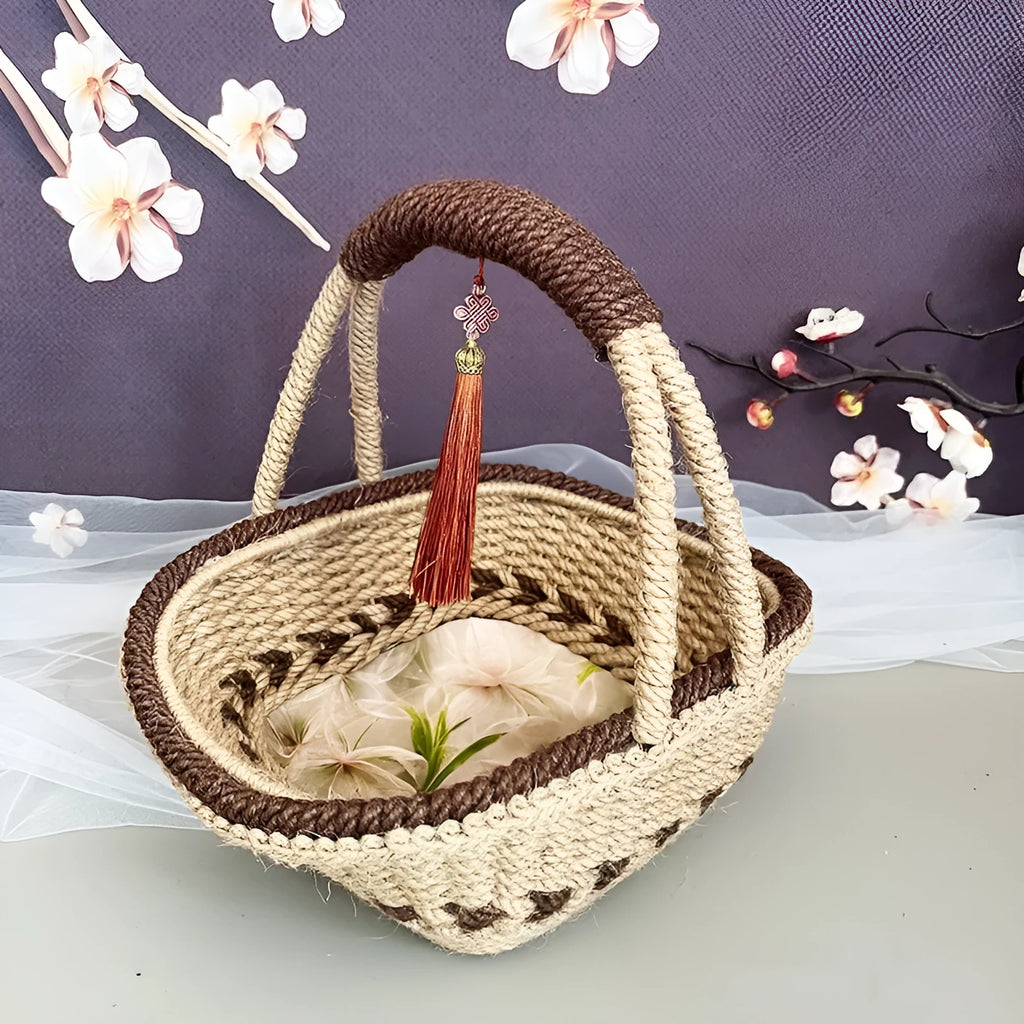 Hand-woven natural straw basket in a light brown colour, measuring 19cm by 12cm.