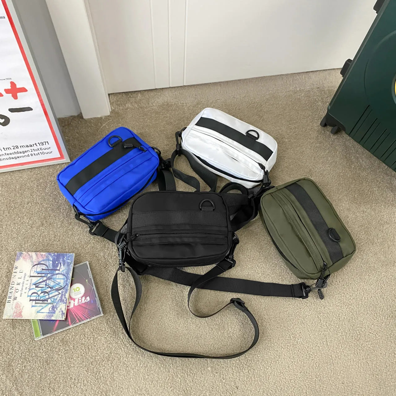 Men's street-style nylon messenger bag in a solid colour with adjustable crossbody strap.