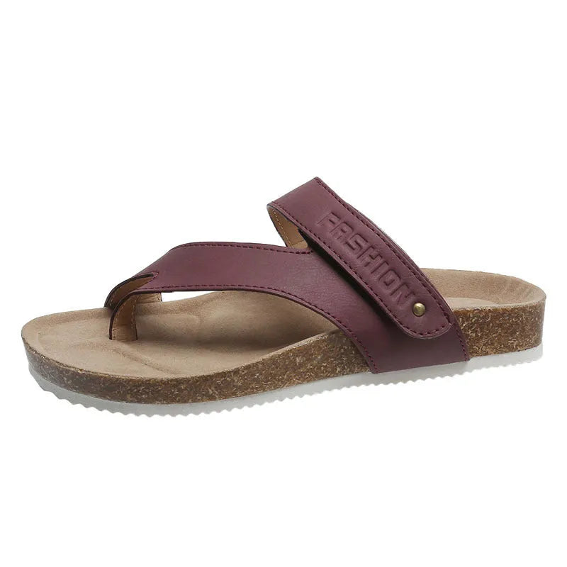 Blue flat toe ring flip-flops with a thick foam sole on a solid background.