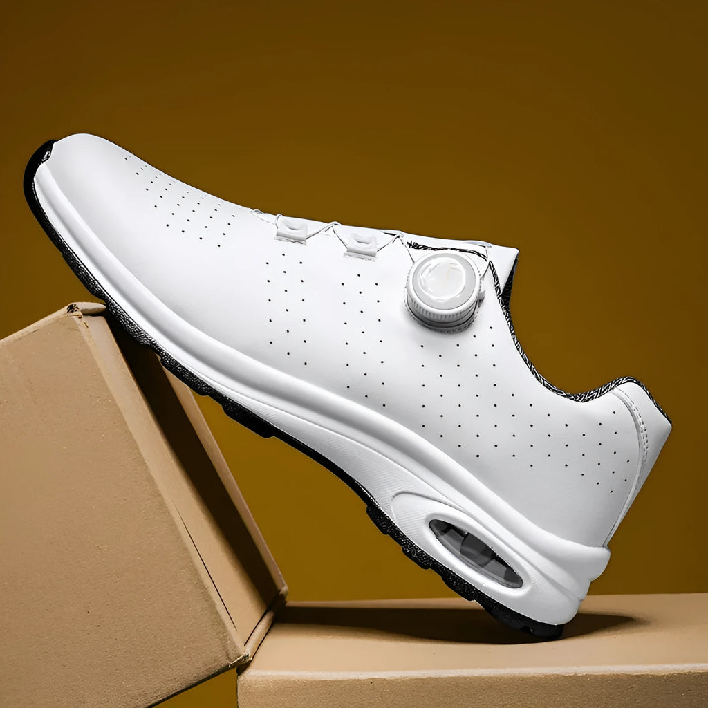 Low top casual tennis shoes in black with mesh upper and composite sole