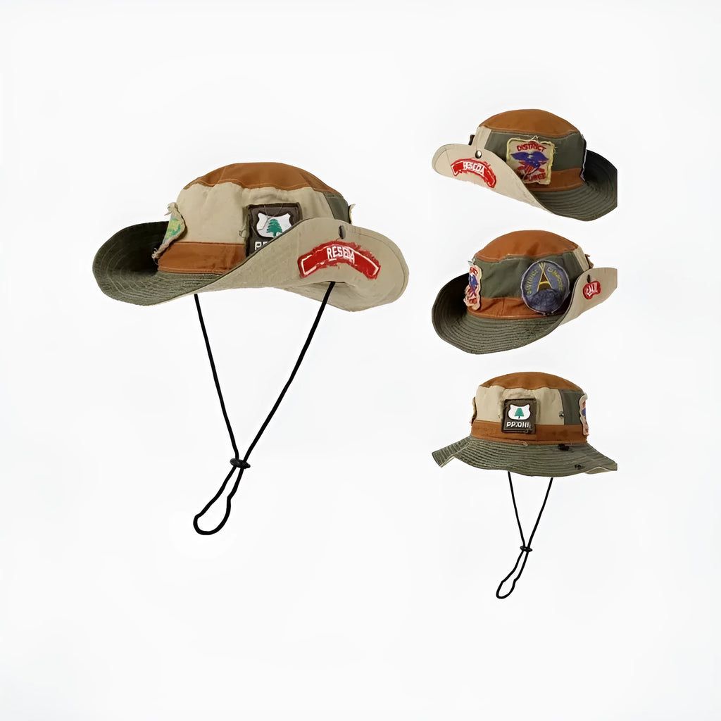 Army green cotton fisherman hat with flat crown and patchwork design folded for storage
