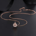 Pure silver rotating snowflake necklace with electroplated finish on adjustable cross chain for women