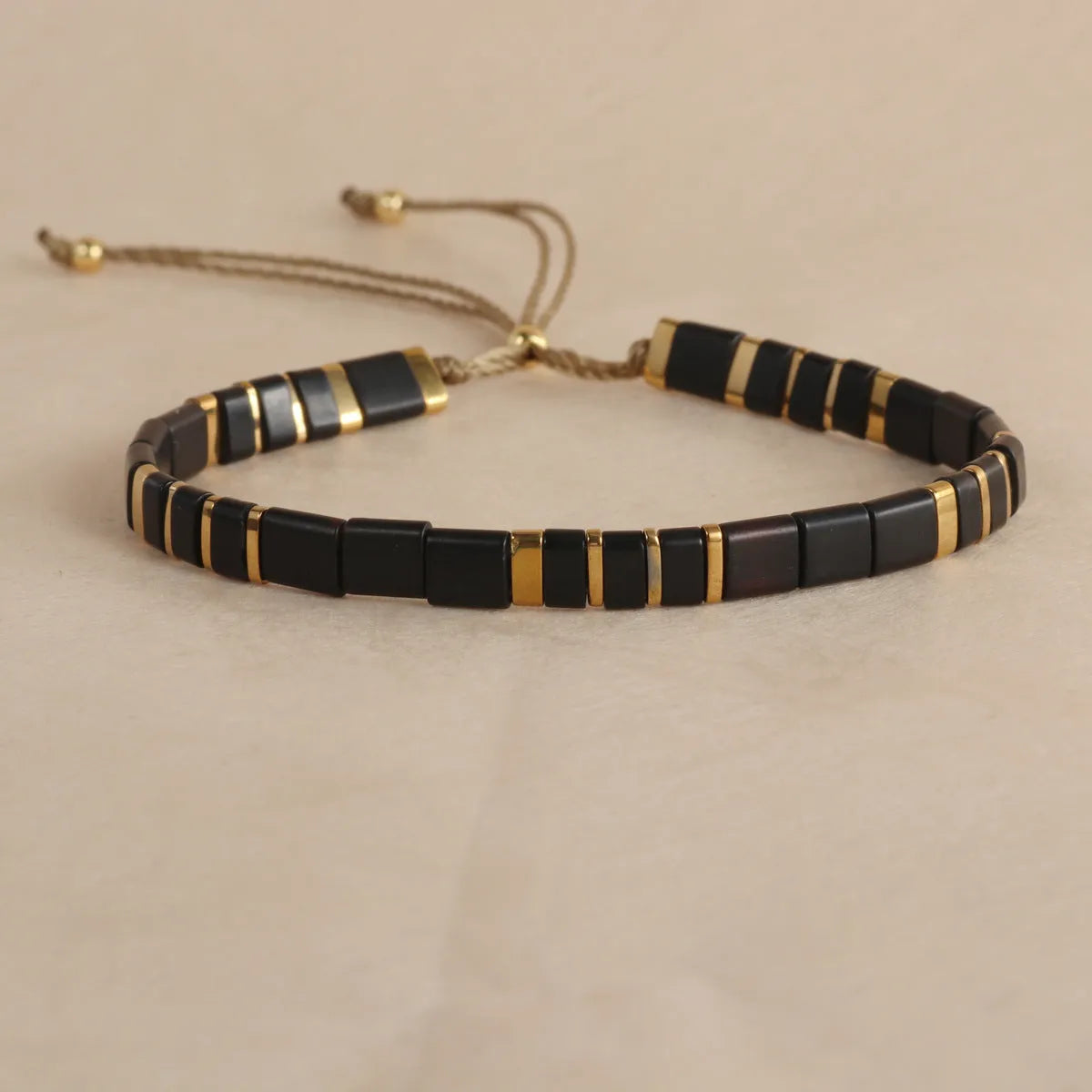 Geometric glass bead bracelet with pull bead closure in five colour options