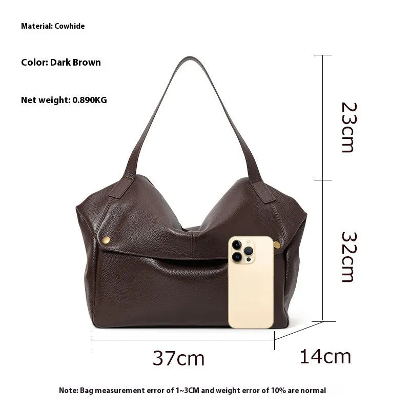 Brown genuine leather women's shoulder bag with a square shape and shoulder strap.