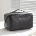 Vertical pattern PU makeup bag showing cubic 22.5cm shape in available colour options