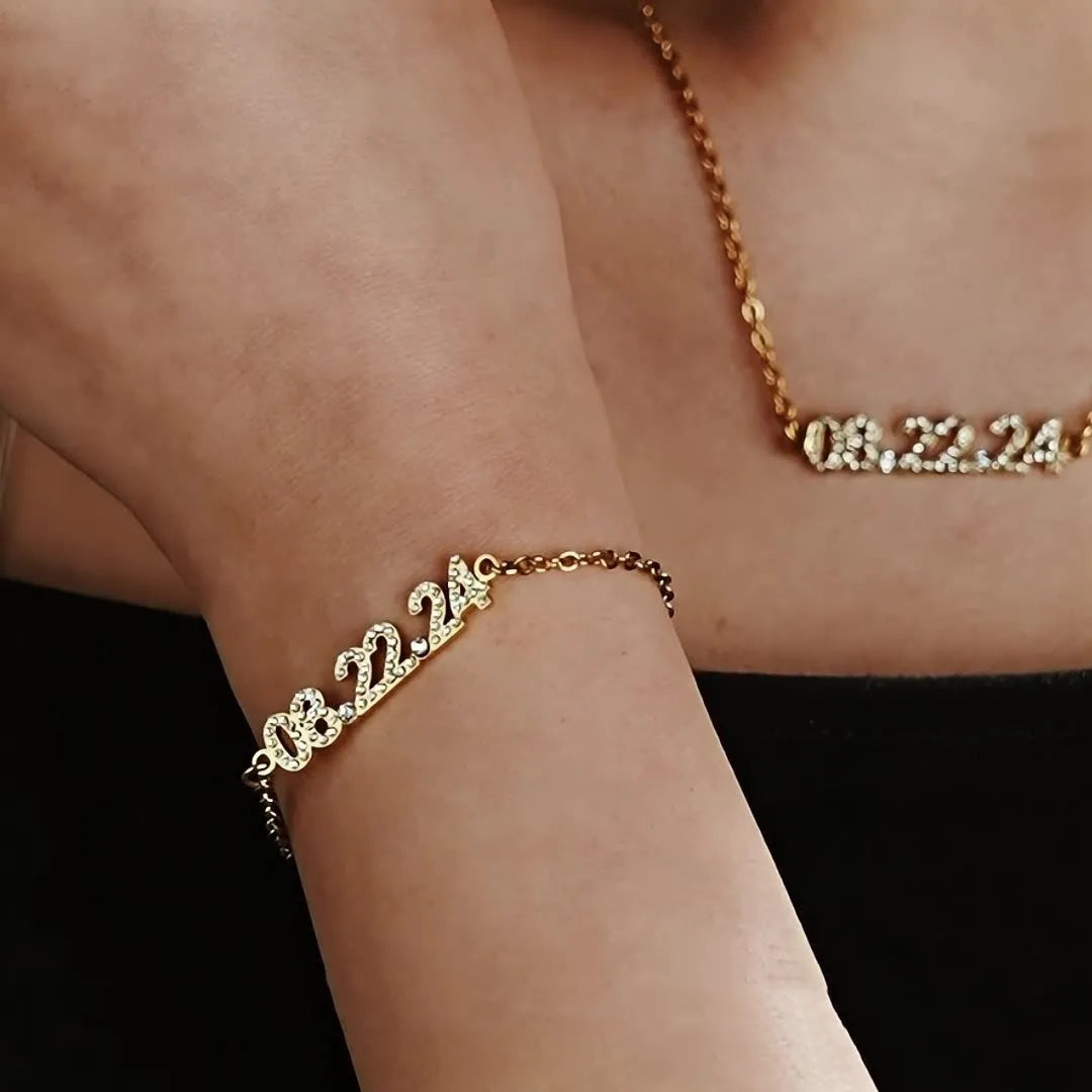 Stainless steel digital bracelet with diamond-studded numbers on the face, shown in a rose gold finish.