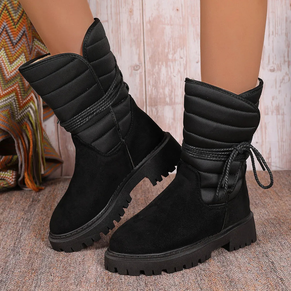 Women's chunky heel mid-tube snow boots in black with lace-up design and rubber sole