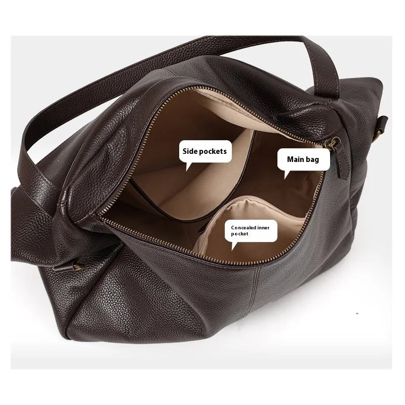 Brown genuine leather women's shoulder bag with a square shape and shoulder strap.