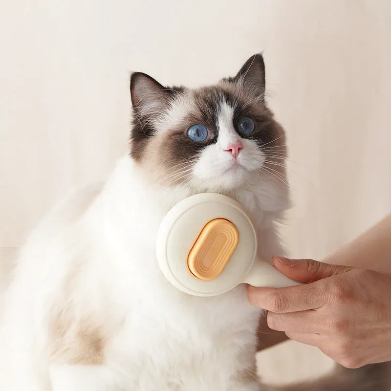 Stainless steel cat grooming brush with non-slip handle in green colour