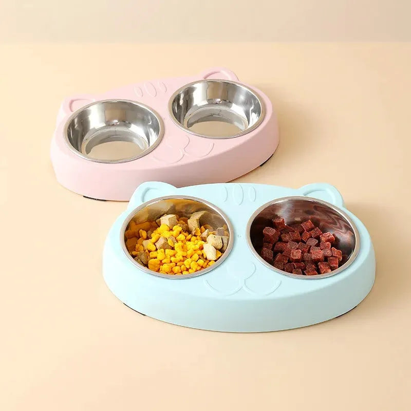 Blue plastic double bowl pet feeder tray with non-slip feet for holding cat or dog food and water dishes.
