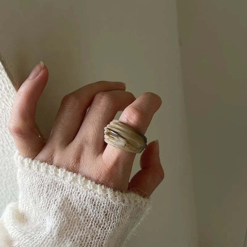 Resin ring with irregular wide band geometric design in Chinese retro style
