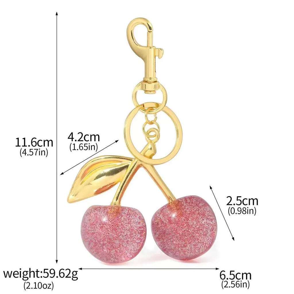 Red zinc alloy cherry pendant keychain with three-dimensional design