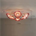 Modern LED ceiling lamp with decorative white or purple flower heads in five or six head configurations