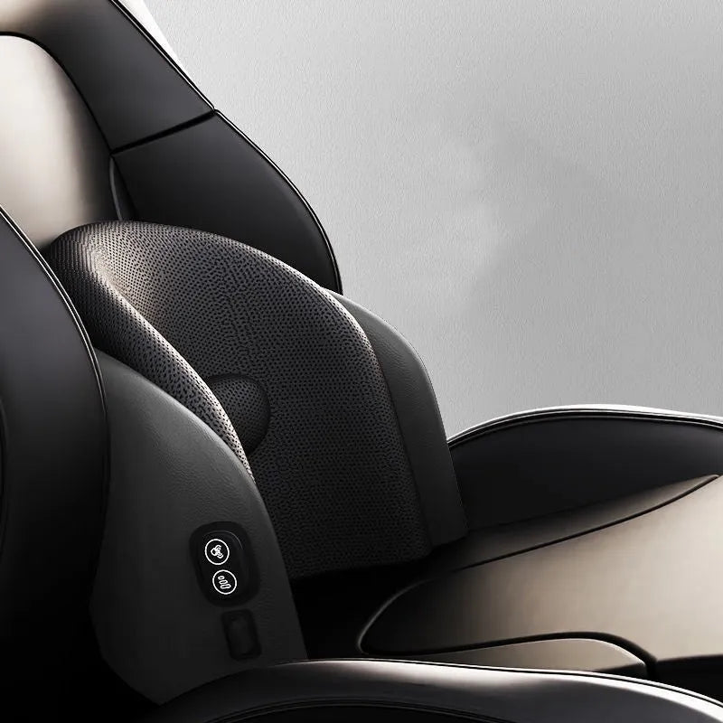 A black car massage cushion with electric vibration controls, placed on a car seat for neck and lumbar support.