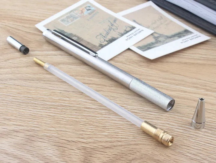 Metal mechanical pencil with automatic lead advancement mechanism and multiple lead size compatibility