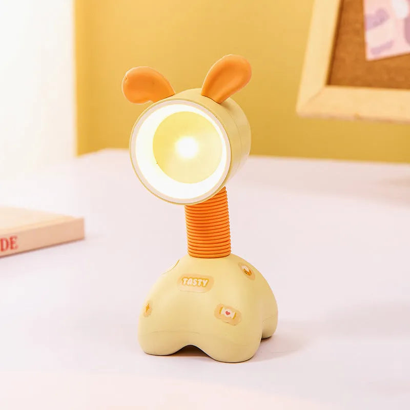 DIY magnetic cartoon small night lamp with multi-angle adjustable lighting on desktop