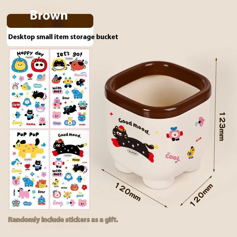 Red and brown cartoon-style plastic desktop storage organiser with grid compartments.