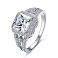Women's platinum-coloured geometric ring with hollow design and inlaid zircon stones