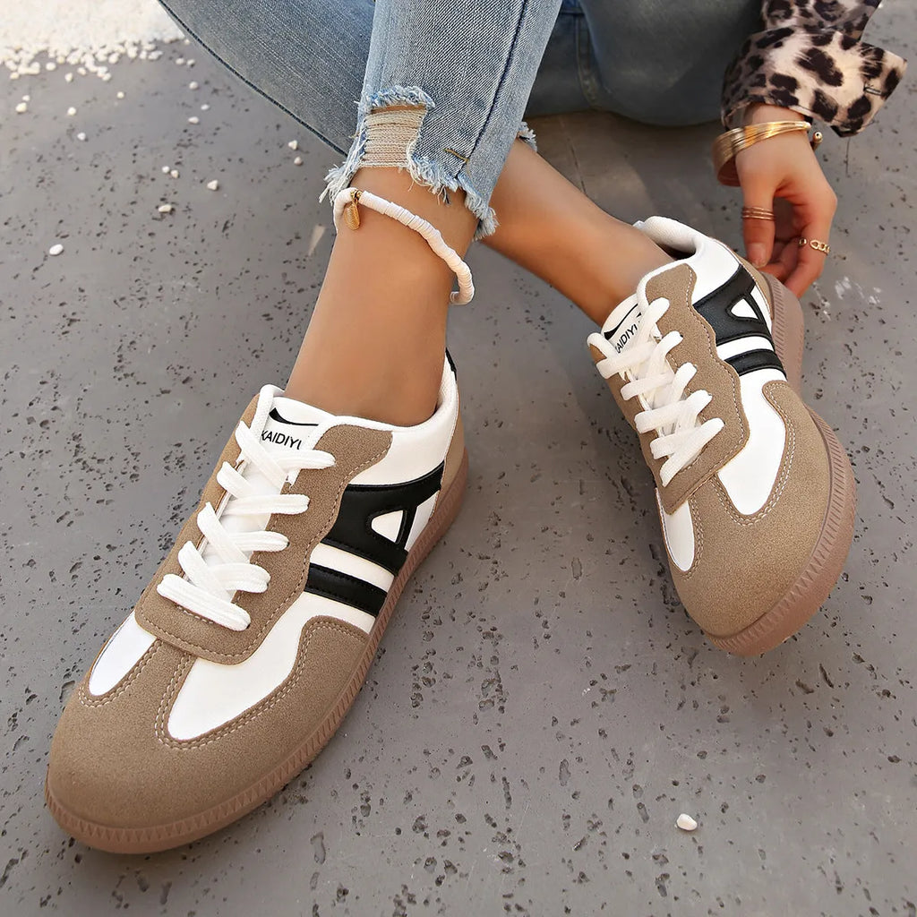 Women's retro colour matching lace-up jogging shoes in grey with a round toe and platform sole.