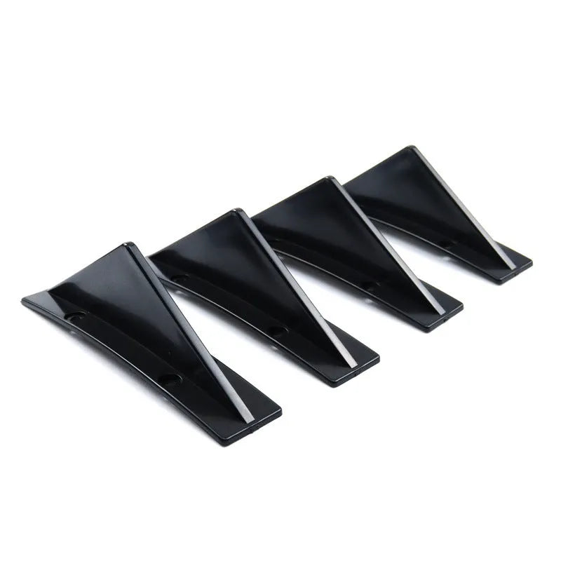 Four triangular automotive rear spoiler units for General Motors vehicles with mounting hardware