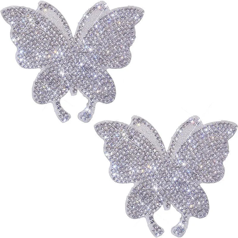 Diamond-encrusted glass car sticker with butterfly or bear paw design measuring 7 by 6 centimetres