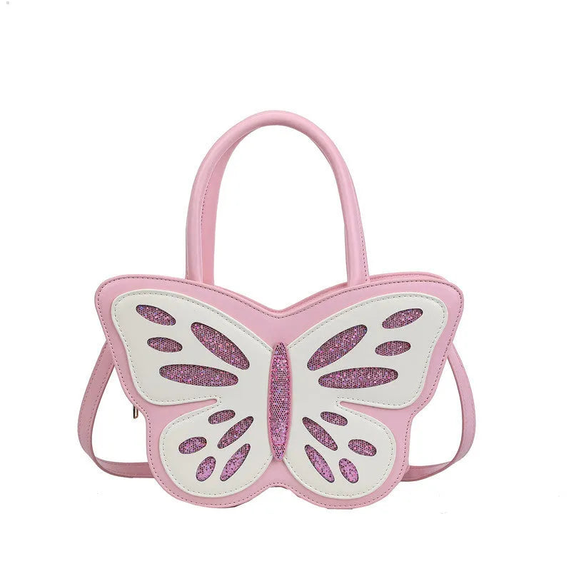 Small square white PU crossbody bag with contrast colour detailing on a model.