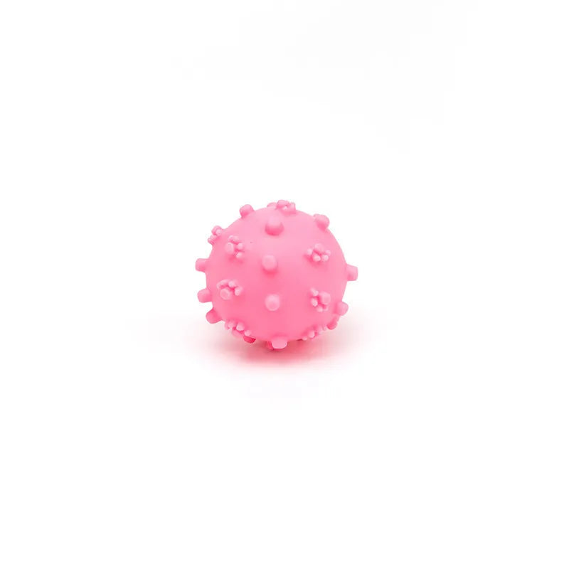 Bright coloured spiked dog toy balls with paw print dimples, 2 inches diameter