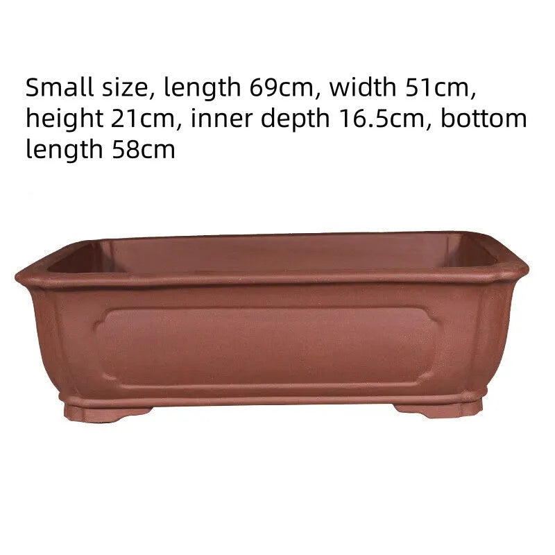 Large rectangular purple clay flowerpot shown on a patio, suitable for bonsai or large plants.