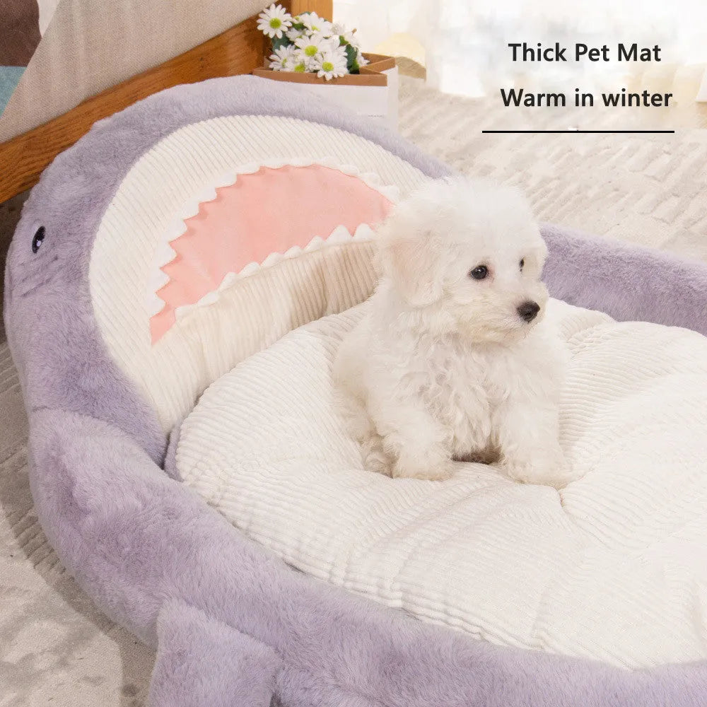 Blue shark pattern pet bed with anti-slip base showing velvet fabric texture