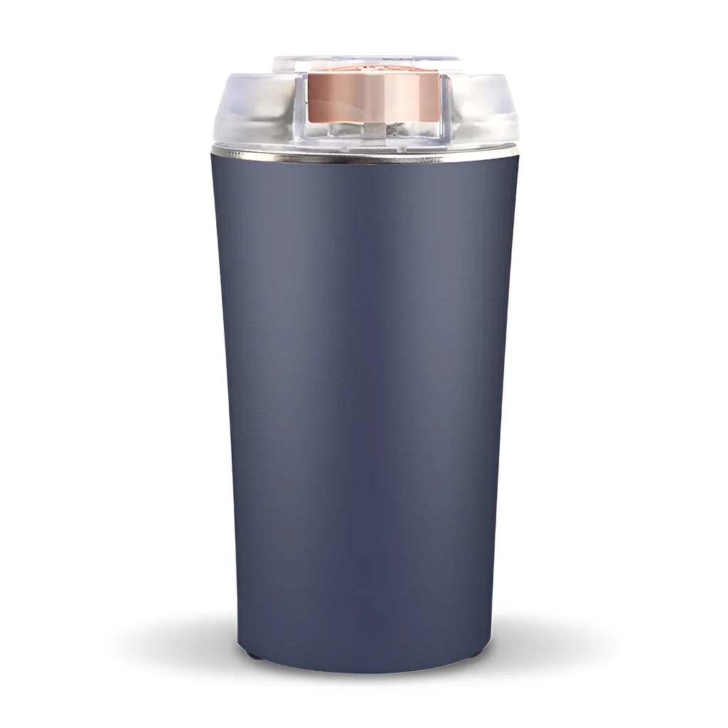 Blue mini flour mill and grain grinder appliance on a kitchen countertop.