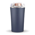 Blue mini flour mill and grain grinder appliance on a kitchen countertop.