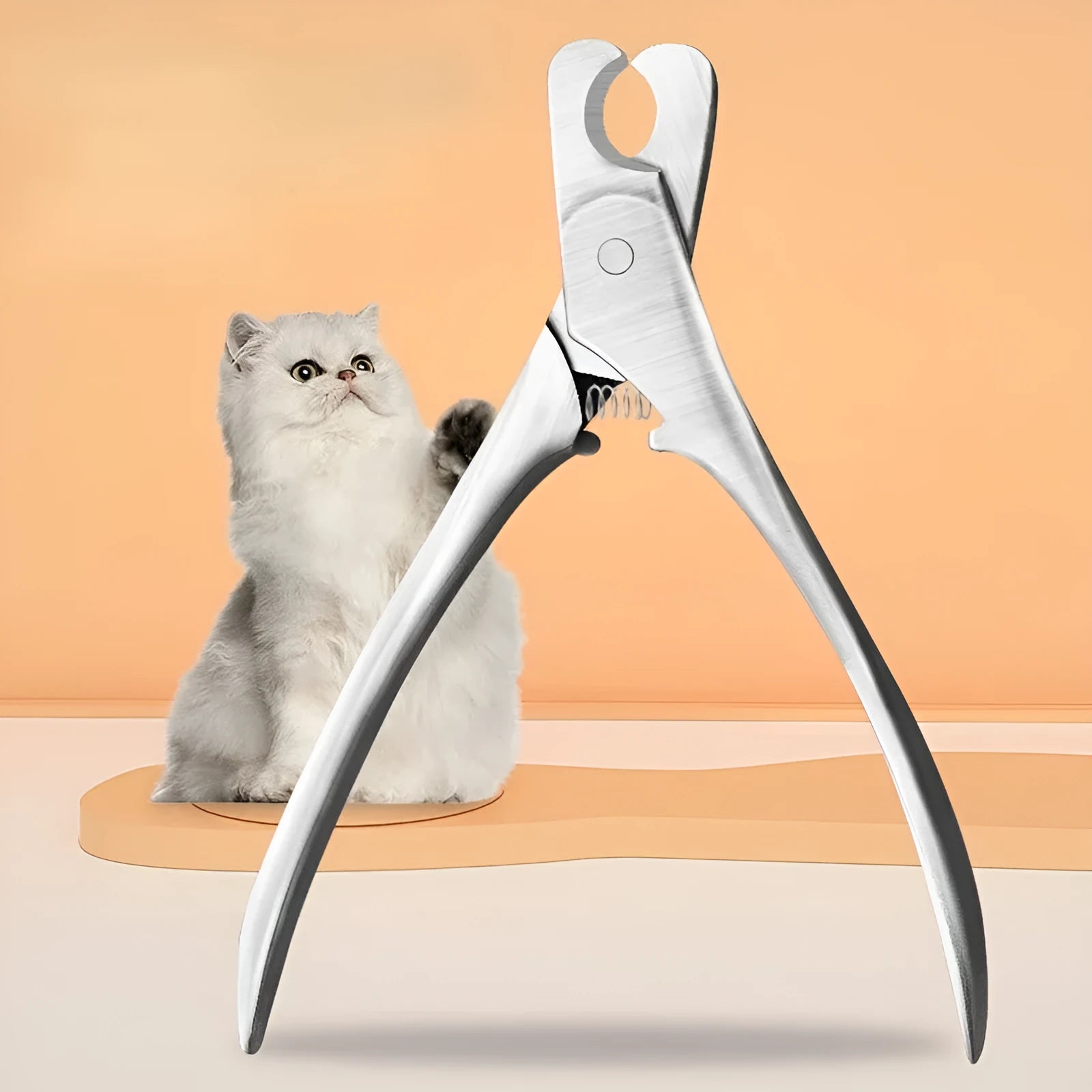 Silver stainless steel pet nail clipper with a quick-stop safety guard for dogs and cats.