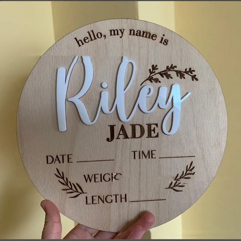 15cm square plywood baby name sign with birth details in one of three available style variants