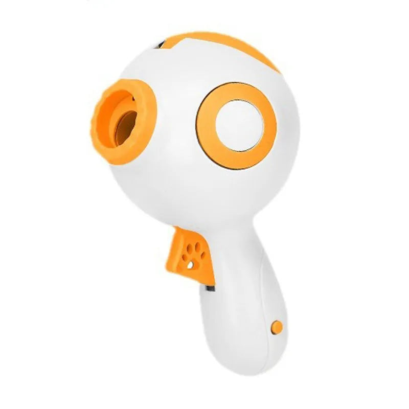 Green, orange, and pink dog treat launcher toy for remote feeding