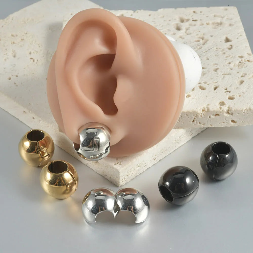 Stainless steel hollow geometric skull and Buddha head earrings with electroplated finish