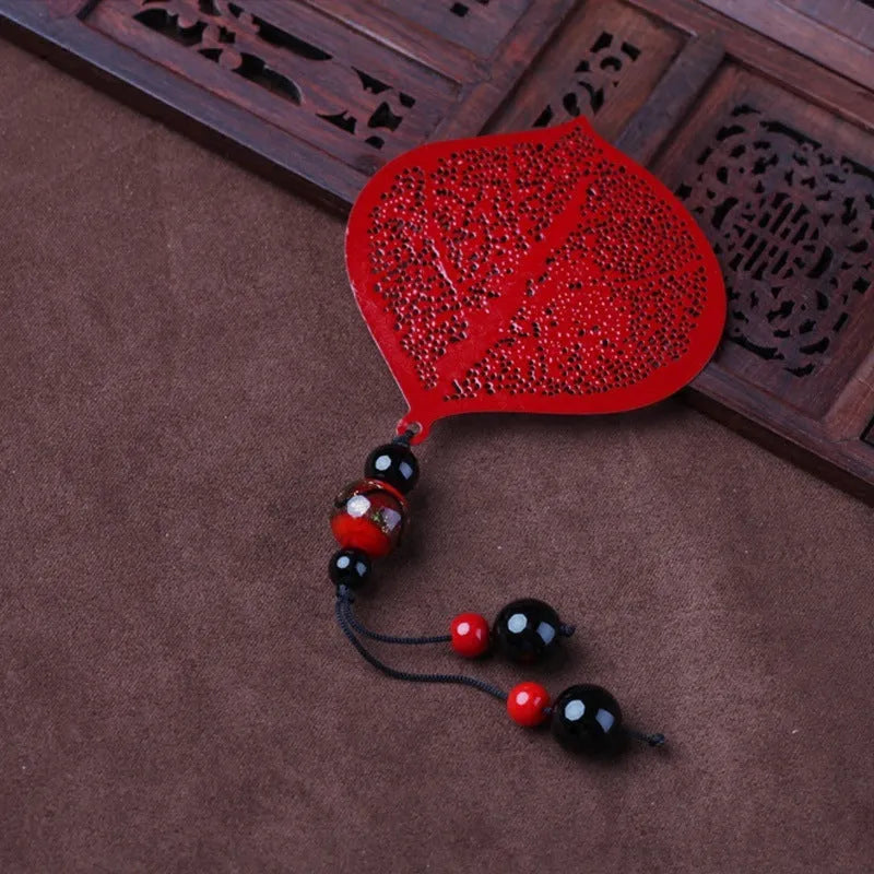 Brass metal bookmark with hollow plating decorative leaf pattern and rose gold tassel