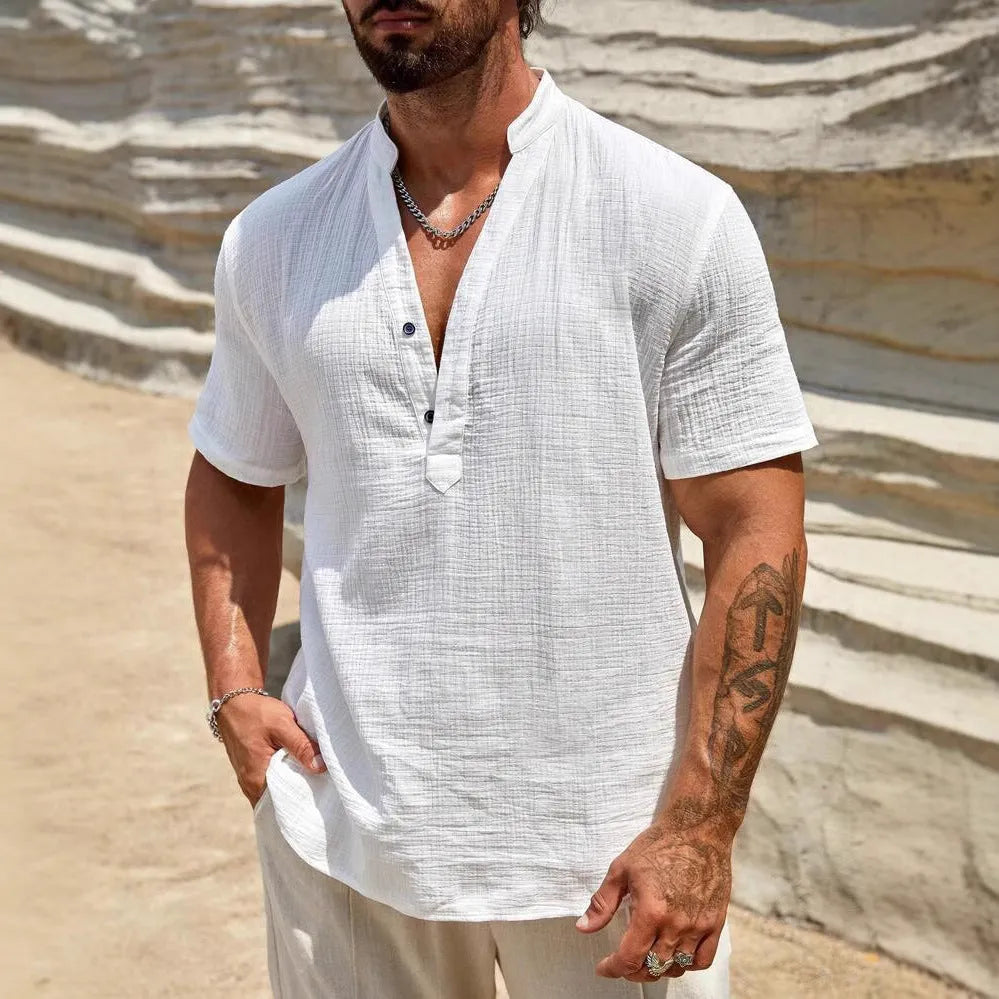 Men's solid colour stand collar short-sleeved shirt in a breathable polyester blend fabric.