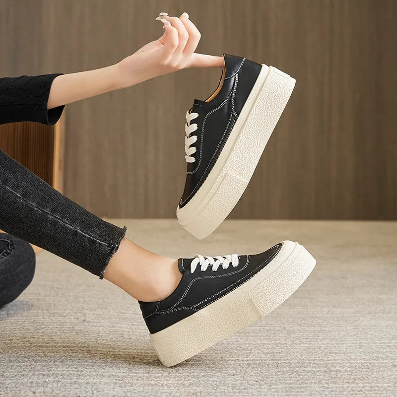 Women's black platform sports board shoes with embossed cowhide upper and lace-up closure