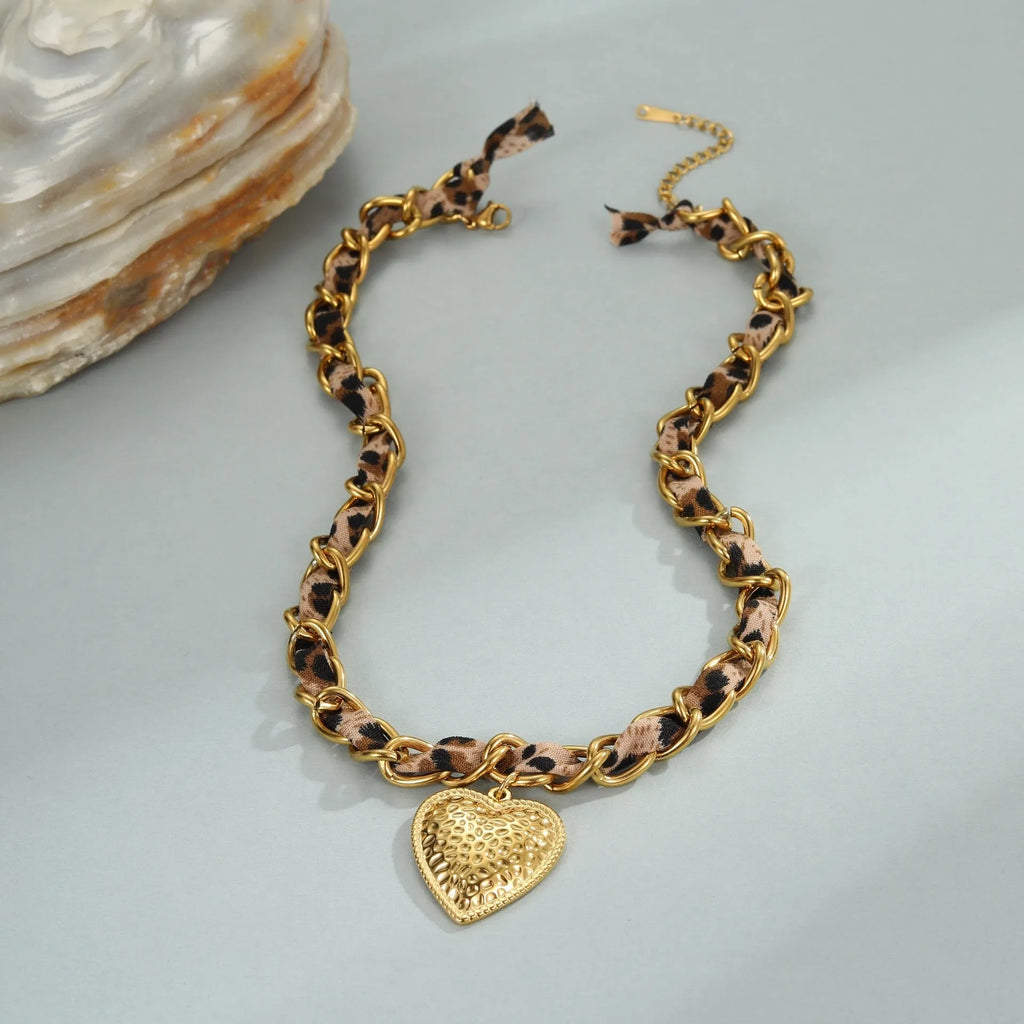 Women's stainless steel necklace with geometric leopard pendant and adjustable chain
