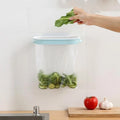 Blue or pink plastic kitchen garbage bag storage rack for cabinet organisation