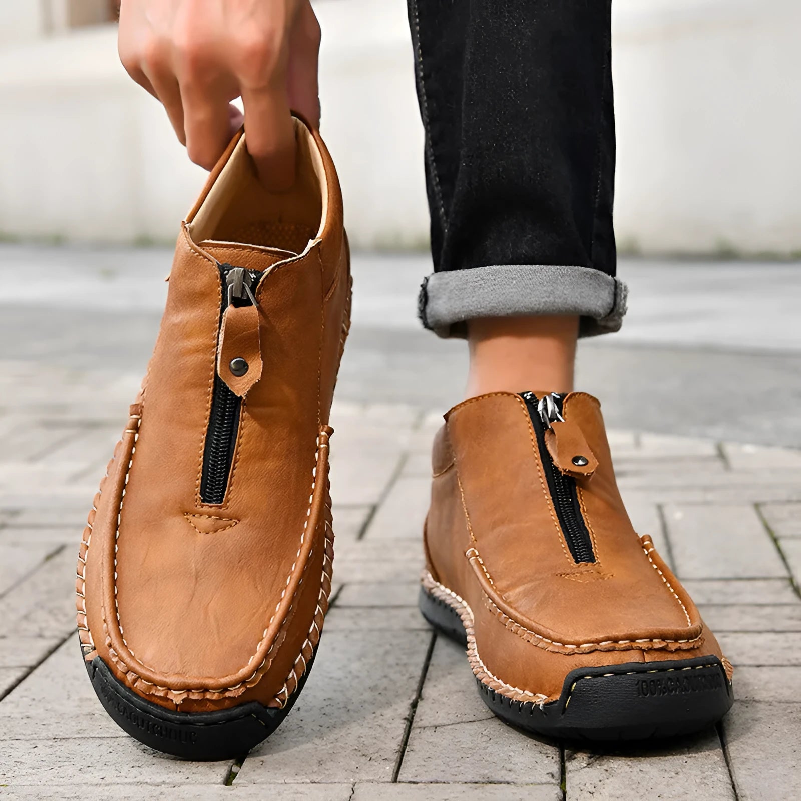 Men's black slip-on loafers with rubber soles and round toe design