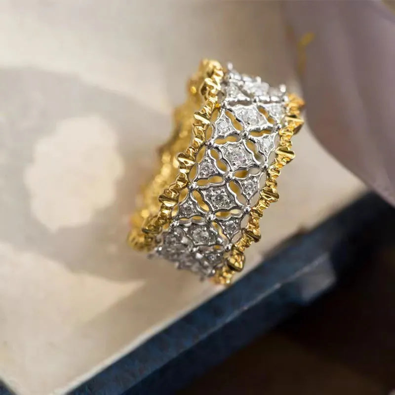 Gold geometric women's copper ring with two-tone electroplated finish and round decorative elements.