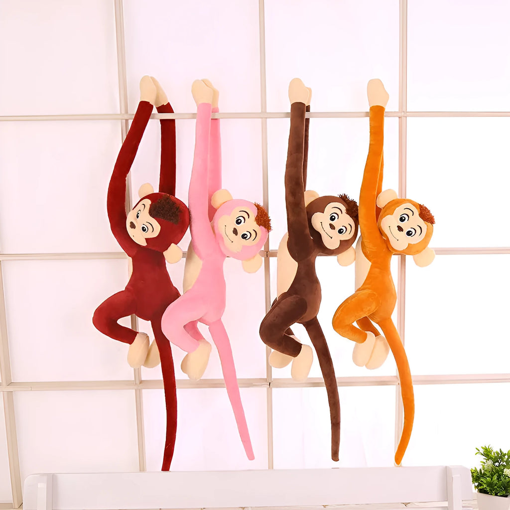 Long arm hanging monkey plush toy in pink, 70cm height, curled around a curtain rod for home decoration