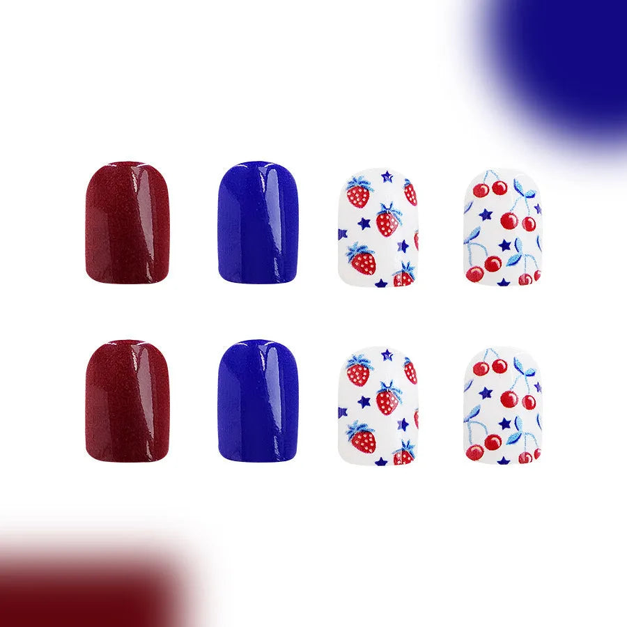 24 short glossy nail stickers with red and blue strawberry and cherry pattern