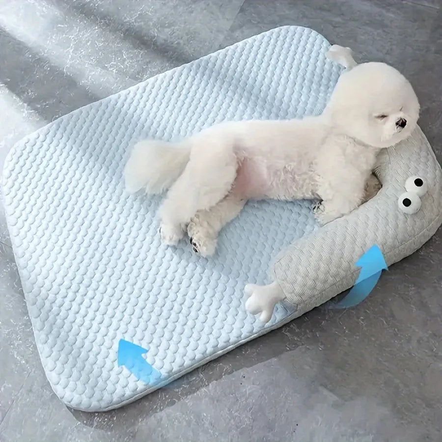 Blue pet bed with big-eyed monster design for dogs and cats, showing non-slip base and breathable fabric.