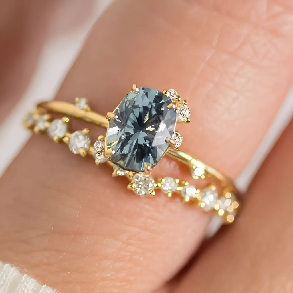 Gold-plated women's ring with flower shape and green zircon stone, shown as a pair.